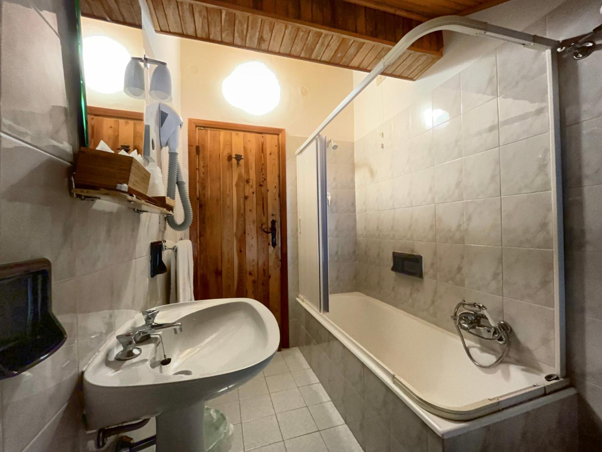 Hotel Garni Mille Pini Сканно Экстерьер фото